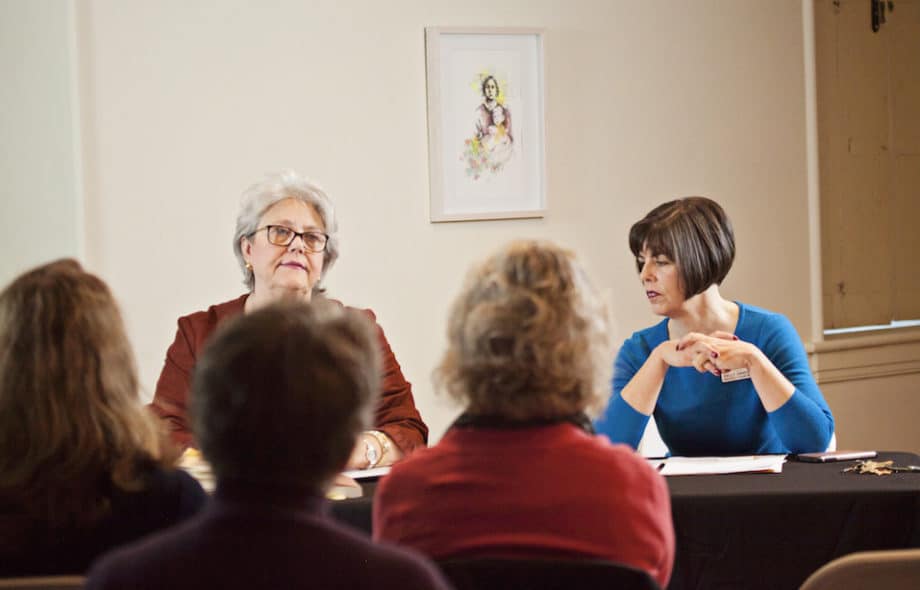 Women leading a discussion.